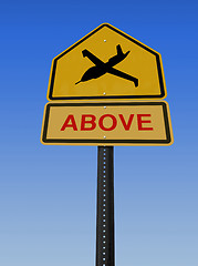 Image showing warning drone above sign