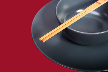 Image showing Bowl with chopsticks