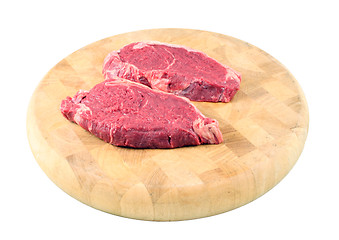 Image showing Steaks on a chopping board