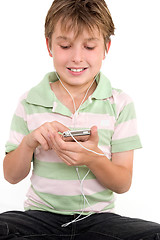 Image showing Child using a digital player