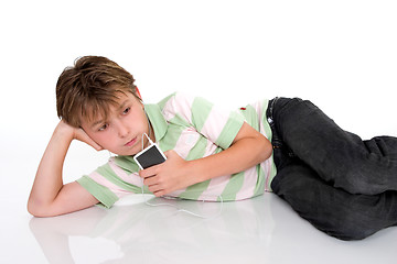 Image showing Child with a portable mp3 player