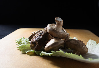 Image showing fresh shiitake mushrooms on a Napa cabbage leaf