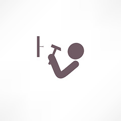 Image showing man hits the nail with a hammer icon