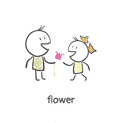 Image showing The guy gives a girl a flower