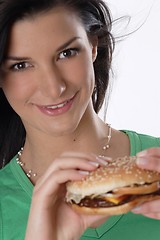 Image showing Woman holding burger