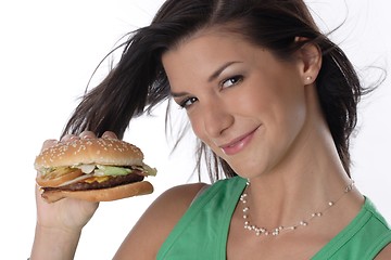 Image showing Woman holding burger