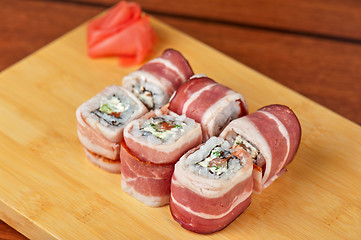 Image showing Sushi roll with bacon