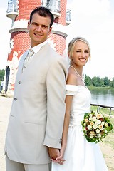 Image showing Newlywed couple posing