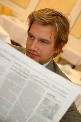 Image showing man reading newspaper