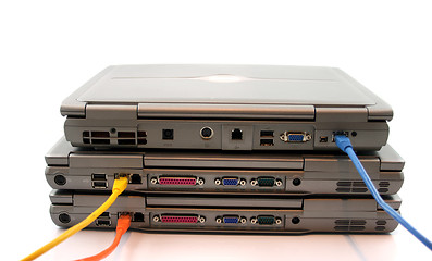 Image showing 3 Laptops with network Cables