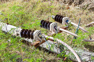 Image showing Old electric pole fallen