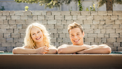 Image showing young couple at the pool