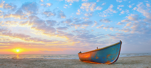 Image showing Fishing boat and sunrise