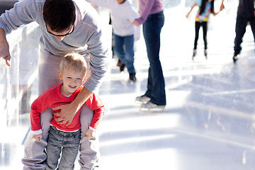 Image showing family ice skating