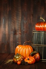 Image showing Fall Themed Scene With Pumpkins on Wood 