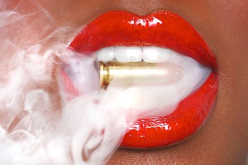 Image showing Lips of a Woman With A Bullet and Smoke