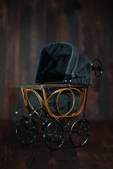 Image showing Baby Cradle on Grunge Wooden Background