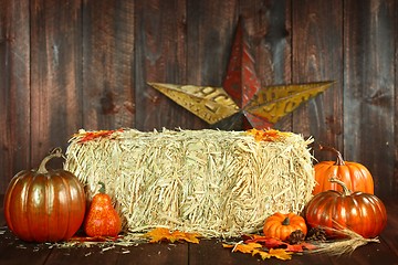 Image showing Fall Themed Scene With Pumpkins on Wood 