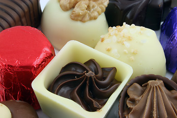 Image showing Luxury Chocolates - focus on single chocolate