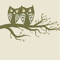 Image showing Two cute owls on the tree branch