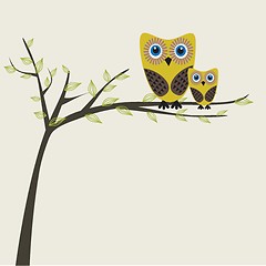 Image showing Two cute owls on the tree branch