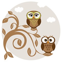 Image showing Two cute owls on the tree branch