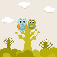 Image showing Two cute owls on the tree branch