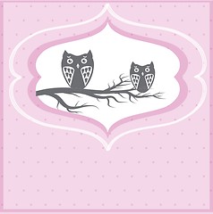 Image showing Two cute owls on the tree branch