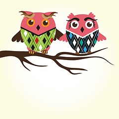Image showing Two cute owls on the tree branch