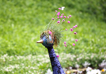 Image showing Sculpture of birds in flowers