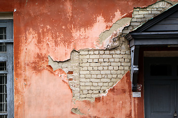 Image showing The wall with the damaged paint coating