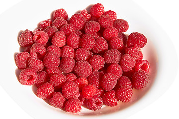 Image showing Raspberries on a plate over white