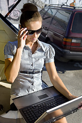 Image showing woman has a fan with laptop computer