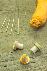 Image showing acupuncture needles, moxibustion cones and ginseng root