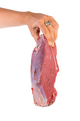 Image showing Hand hold raw veal slab