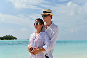 Image showing happy young couple have fun on beach