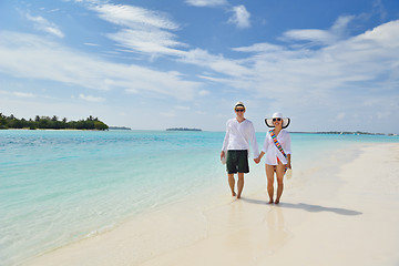 Image showing happy young couple have fun on beach