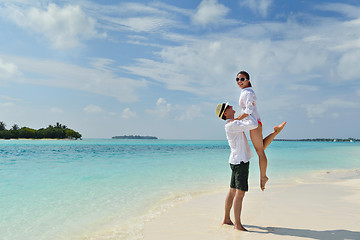 Image showing happy young couple have fun on beach