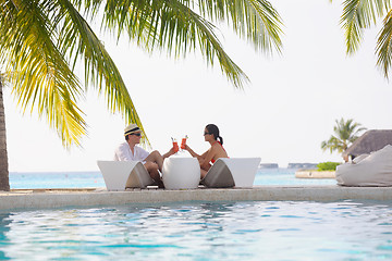 Image showing happy young couple relax and take fresh drink