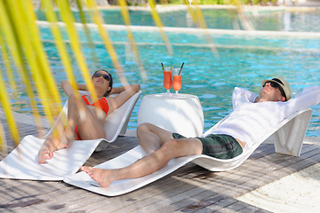 Image showing happy young couple relax and take fresh drink