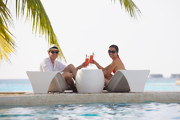 Image showing happy young couple relax and take fresh drink