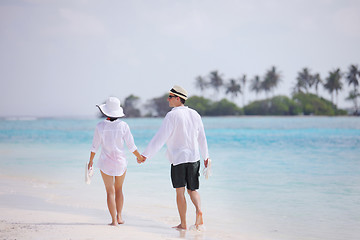 Image showing happy young couple have fun on beach