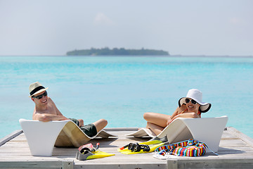 Image showing happy young couple have fun on beach