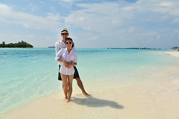 Image showing happy young couple have fun on beach