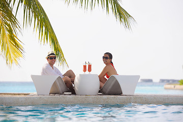 Image showing happy young couple relax and take fresh drink