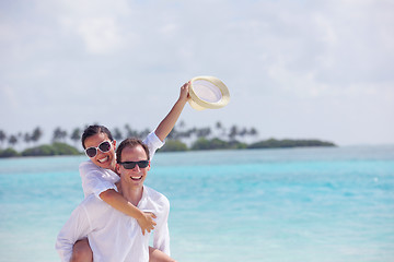 Image showing happy young couple have fun on beach