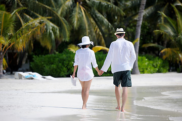 Image showing happy young couple have fun on beach