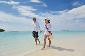 Image showing happy young couple have fun on beach