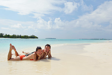 Image showing happy young couple have fun on beach