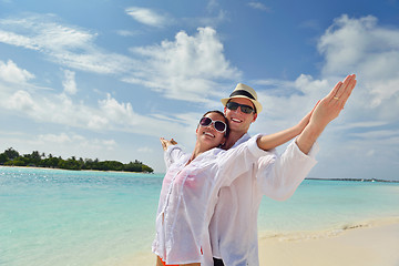 Image showing happy young couple have fun on beach